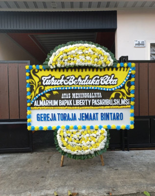 Papan Bunga Duka di Periuk