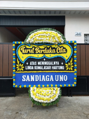 Papan Bunga Duka di Periuk
